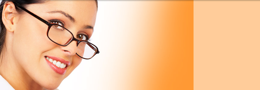 woman in glasses orange background