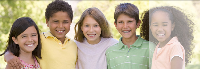 photo of a smiling group of orthodontic patients