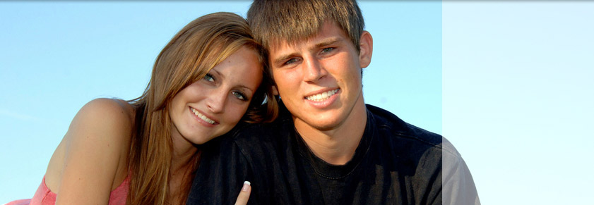 couple with blue background